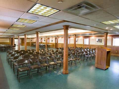 Gorham Hall with chairs and a podium